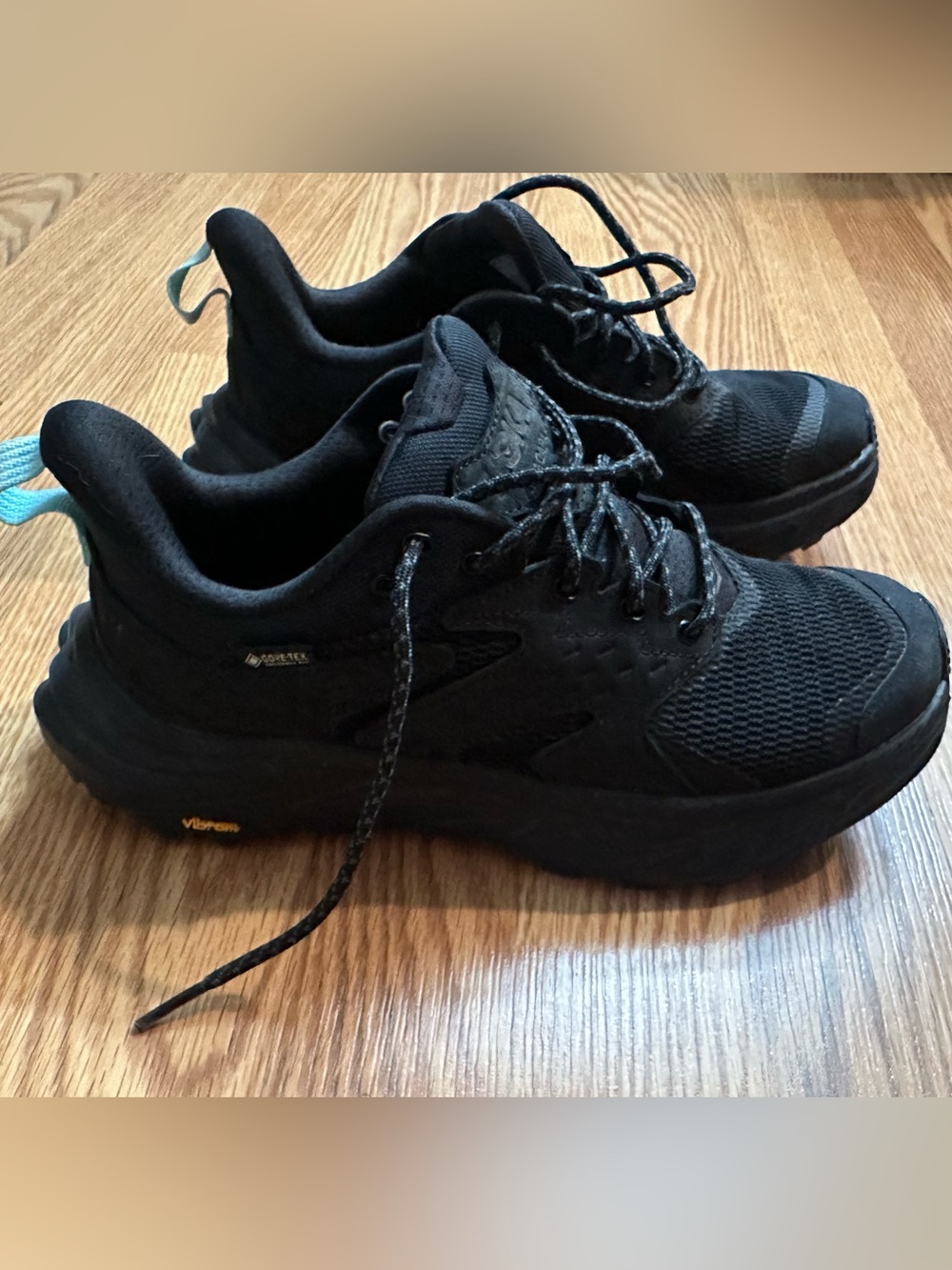 Hoka Women's Black Sneakers with Light Blue Heel Pull